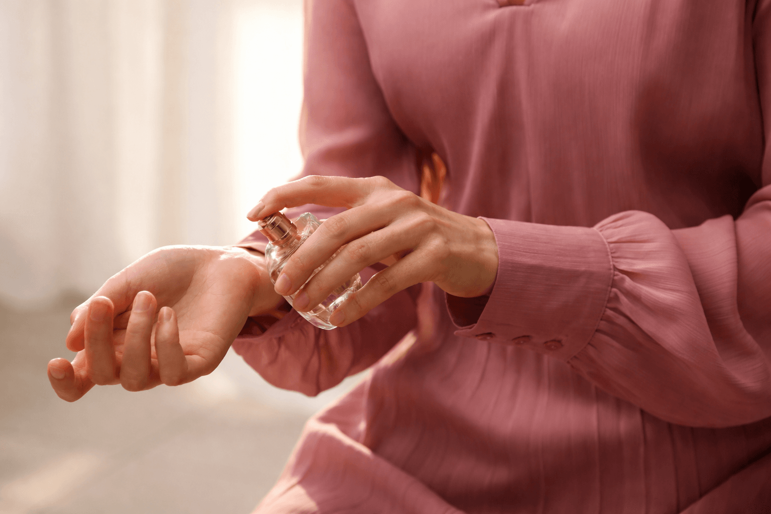Applying perfume to wrist - Floward.png