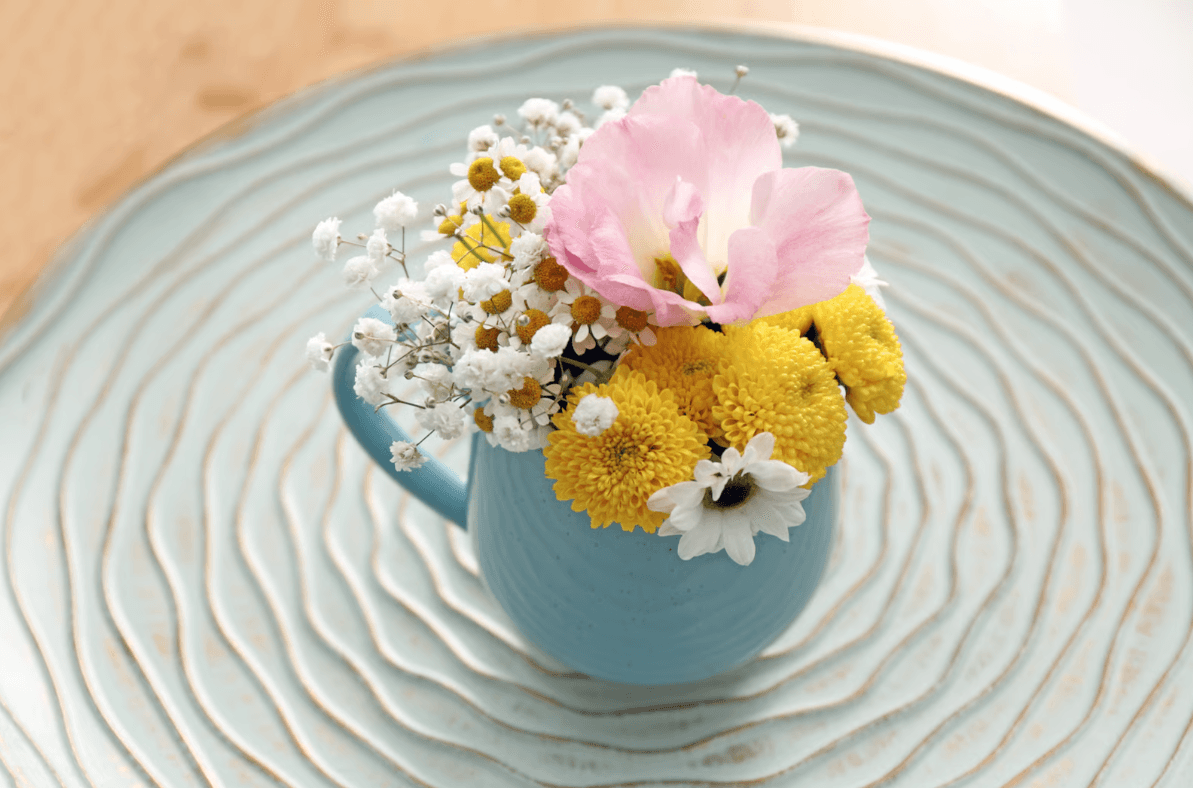 Flowers in a blue mug - décor ideas from Floward.png