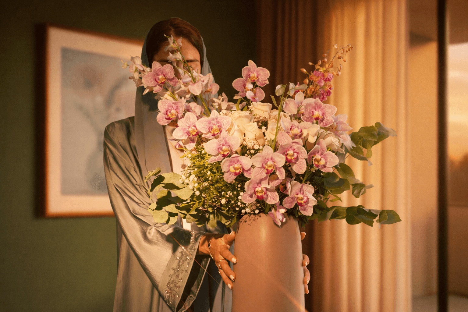 Orchid flowers in vase.png