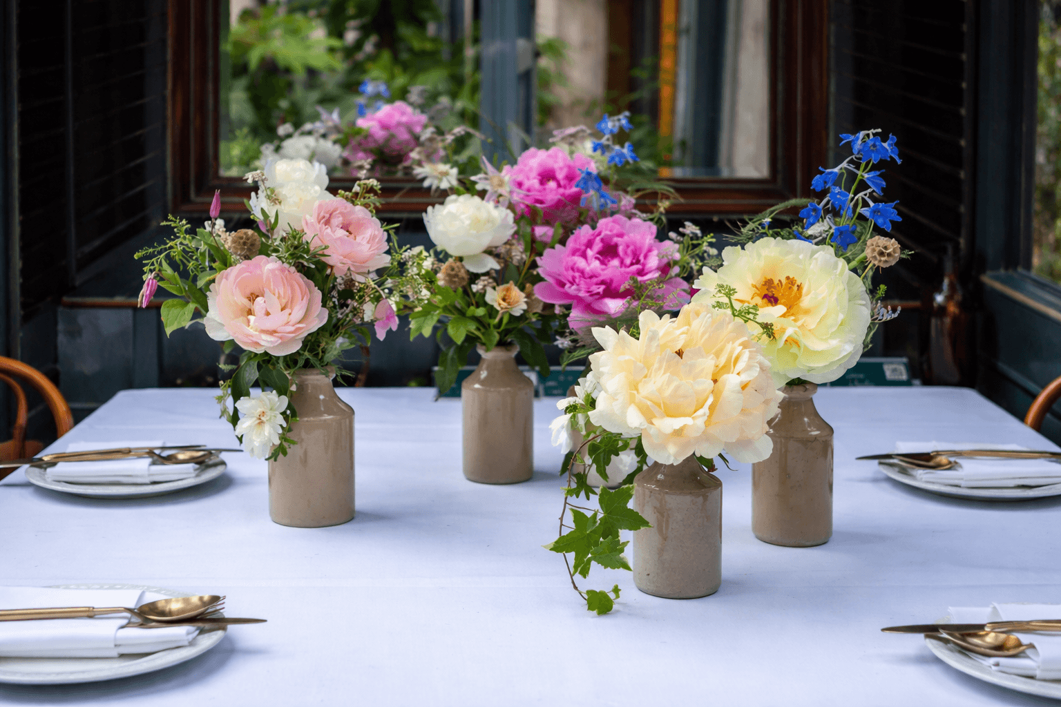 Peonies flowers in vases for decor - Floward.png