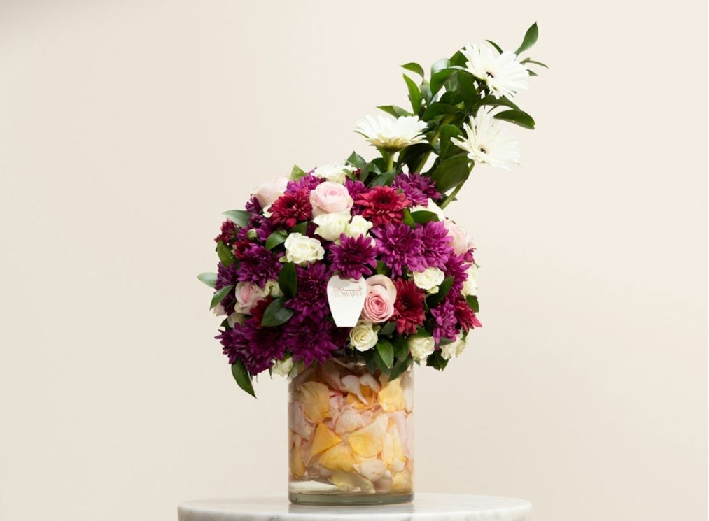 Purple Chrysanthemum floral arrangement in vase.jpg