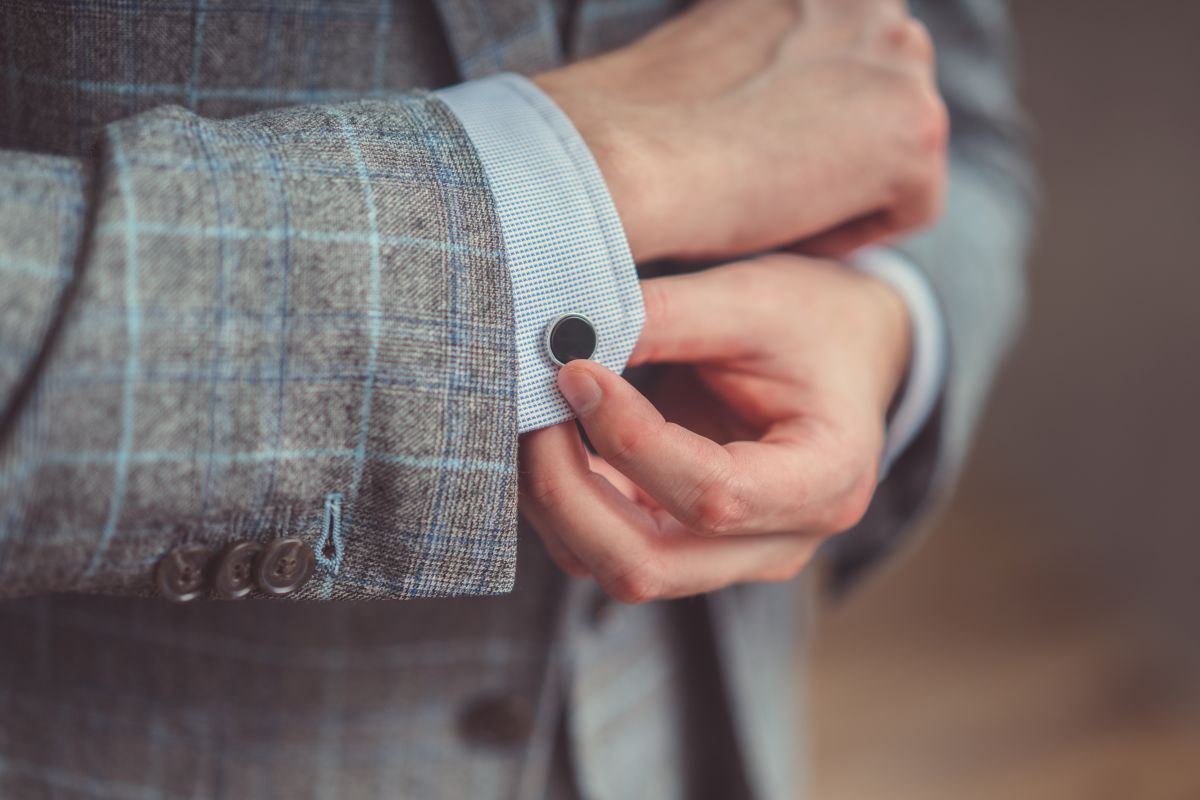cufflink-on-gray-checked-jacket-slee elegant Men's accessories.jpg