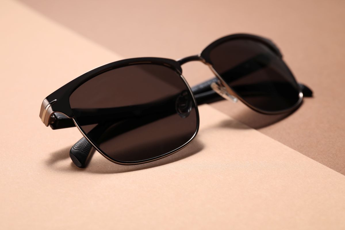 sleek-black-sunglasses-on-a-minimalist-brown-men's sunglasses accessories .jpg