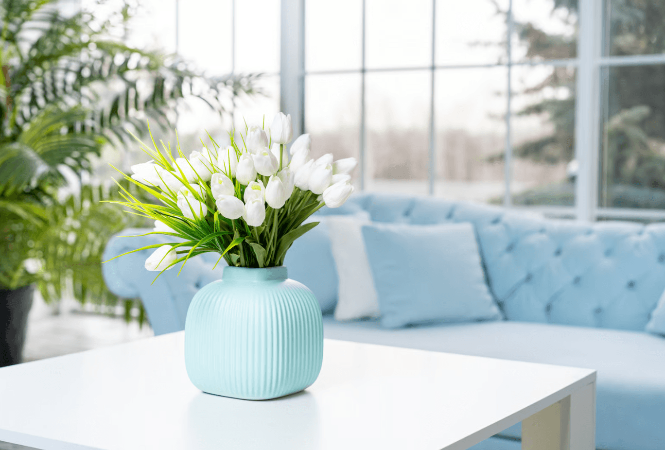 white tulips in blue ceramic vase - Floward online gifts.png
